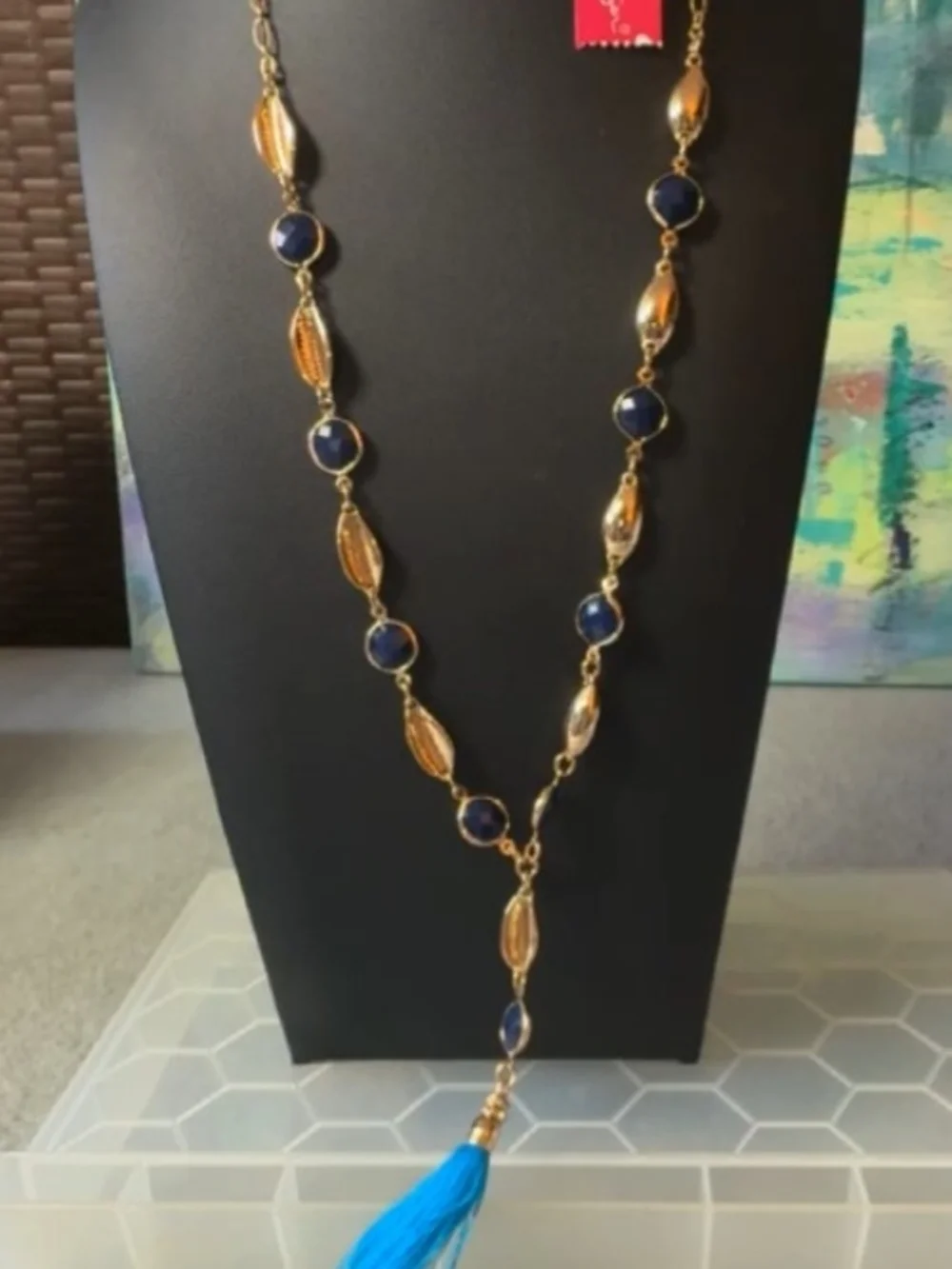 Lilly Pulitzer necklace features a vibrant blue tassel & gold-tone chain - NWT